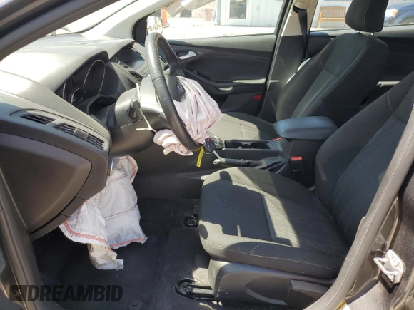 2018 Ford Focus SE z VIN 1FADP3F20JL257320, wystawiony jako Copart lot #55956435 z przebiegiem 26 919 mil mil oraz Szkoda całkowita • Salvage title. Historia ofert i sprzedaży dostępna na DreamBid. Obrazek 7.