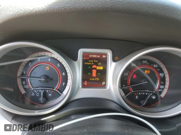 2017 Dodge Journey SXT z VIN 3C4PDCBG0HT509616, wystawiony jako Copart lot #55271225 z przebiegiem 107 099 mil mil oraz Szkoda całkowita • Salvage title. Historia ofert i sprzedaży dostępna na DreamBid. Obrazek 9.