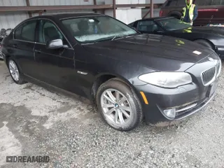 2013 BMW 5 Series 528i xDrive with VIN WBAXH5C50DD113566, listed as a IAAI auction lot 41981416 with 123,330 mi miles. Bid and sale history available at carsss.com. Image 1.