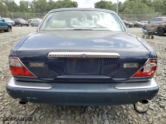 2000 Jaguar XJ VDP with VIN SAJDA24CXYLF13463, listed as a Copart auction lot 67797454 with 144,765 mi miles and Clean Title. Bid and sale history available at carsss.com. Image 6.