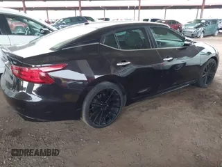 2016 Nissan Maxima SL z VIN 1N4AA6AP5GC382668, wystawiony jako IAAI lot #41451440 z przebiegiem 163 884 mil mil oraz . Historia ofert i sprzedaży dostępna na DreamBid. Obrazek 4.