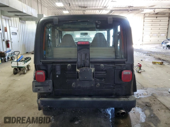 1997 Jeep Wrangler Sahara with VIN 1J4FY49S7VP506996, listed as a Copart auction lot 50531875 with 100,380 mi miles and Clean Title. Bid and sale history available at carsss.com. Image 6.