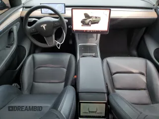 2024 Tesla Model Y Long Range z VIN 7SAYGAEEXRF987104, wystawiony jako Copart lot #54056015 z przebiegiem 24 027 mil mil oraz Szkoda całkowita • Salvage title. Historia ofert i sprzedaży dostępna na DreamBid. Obrazek 8.