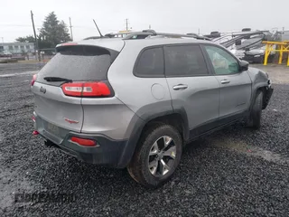 2014 Jeep Cherokee Trailhawk with VIN 1C4PJMBB3EW222747, listed as a IAAI auction lot 41622880 with 183,349 mi miles. Bid and sale history available at carsss.com. Image 4.