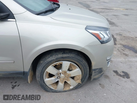 2015 Chevrolet Traverse LTZ z VIN 1GNKRJKD6FJ237851, wystawiony jako IAAI lot #41847524 z przebiegiem 84 809 mil mil oraz . Historia ofert i sprzedaży dostępna na DreamBid. Obrazek 6.
