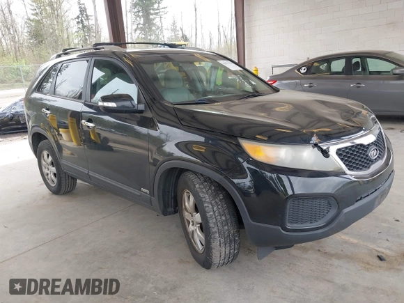 2011 Kia Sorento LX with VIN 5XYKTDA24BG170561, listed as a IAAI auction lot 42011756 with 211,833 mi miles. Bid and sale history available at carsss.com. Image 1.