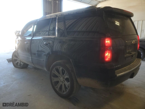 2015 Chevrolet Tahoe LTZ with VIN 1GNSCCKC1FR107904, listed as a Copart auction lot 46623105 with 191,793 mi miles and Salvage Title. Bid and sale history available at carsss.com. Image 2.