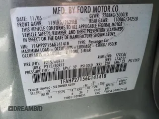 2006 Ford Five Hundred SEL with VIN 1FAHP27156G141418, listed as a Copart auction lot 52589885 with 211,661 mi miles and Salvage Title. Bid and sale history available at carsss.com. Image 12.