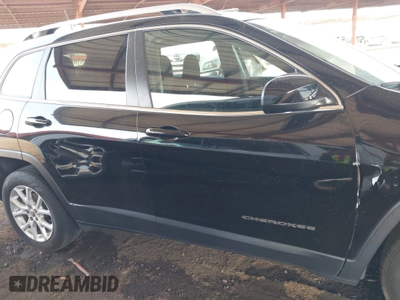 2017 Jeep Cherokee Latitude with VIN 1C4PJLCB1HW641872, listed as a IAAI auction lot 41404099 with 64,782 mi miles and . Bid and sale history available at carsss.com. Image 13.