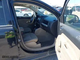 2014 Jeep Compass Sport with VIN 1C4NJCBA6ED630812, listed as a IAAI auction lot 42026664 with 134,445 mi miles. Bid and sale history available at carsss.com. Image 5.