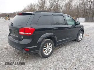 2014 Dodge Journey SXT with VIN 3C4PDCBG1ET142687, listed as a IAAI auction lot 41698232 with 170,521 mi miles. Bid and sale history available at carsss.com. Image 4.