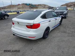 2016 BMW 3 Series GT 328i xDrive with VIN WBA8Z5C52GG502293, listed as a IAAI auction lot 42007325 with 64,659 mi miles. Bid and sale history available at carsss.com. Image 4.