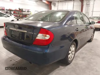 2003 Toyota Camry LE with VIN 4T1BE30K03U152348, listed as a IAAI auction lot 42082892 with 224,721 mi miles and . Bid and sale history available at DreamBid. Image 4.