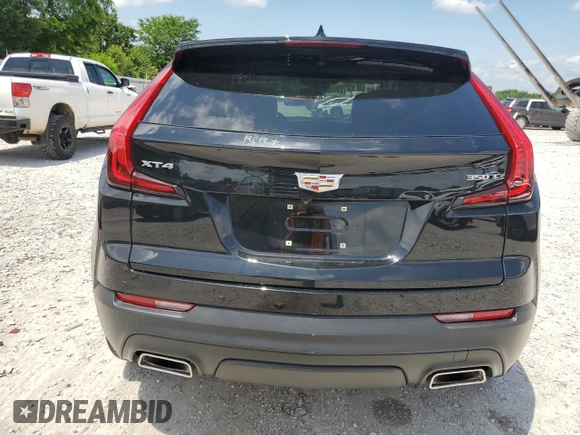 2023 Cadillac XT4 FWD Luxury с VIN 1GYAZAR47PF107473, выставлен на аукционе Copart как лот 59137665 с пробегом 9 198 миль миль и Списание • Salvage title. История ставок и продаж доступна на DreamBid. Изображение 6.