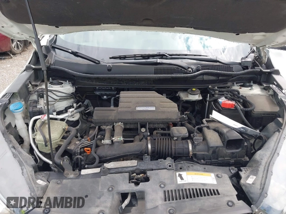 2018 Honda CR-V Touring with VIN 2HKRW2H91JH665241, listed as a IAAI auction lot 42638694 with 62,066 mi miles and . Bid and sale history available at DreamBid. Image 10.