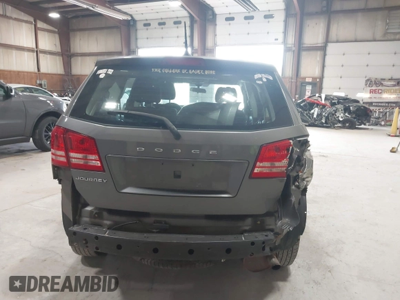 2013 Dodge Journey American Value with VIN 3C4PDCAB1DT508765, listed as a IAAI auction lot 42149373 with 159,113 mi miles and . Bid and sale history available at DreamBid. Image 16.