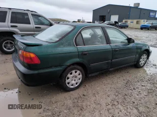 2000 Honda Civic LX with VIN 2HGEJ6676YH512977, listed as a Copart auction lot 50985455 with 242,759 mi miles and Salvage Title. Bid and sale history available at DreamBid. Image 3.