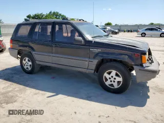 1995 Jeep Grand Cherokee Laredo z VIN 1J4FX58S9SC534442, wystawiony jako Copart lot #61233725 z przebiegiem 363 688 mil mil oraz Szkoda całkowita • Salvage title. Historia ofert i sprzedaży dostępna na DreamBid. Obrazek 4.