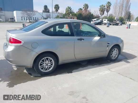 2008 Ford Focus SE with VIN 1FAHP33NX8W135881, listed as a IAAI auction lot 41668949 with 160,261 mi miles. Bid and sale history available at carsss.com. Image 4.
