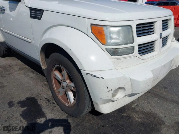 2010 Dodge Nitro SXT with VIN 1D4PU5GK3AW115958, listed as a IAAI auction lot 40357456 with 162,548 mi miles. Bid and sale history available at carsss.com. Image 18.