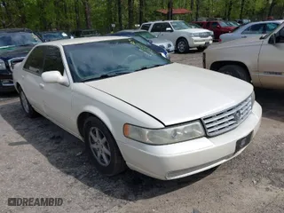 2001 Cadillac Seville Luxury SLS w/Monochrome Pkg with VIN 1G6KS54Y71U223875, listed as a IAAI auction lot 41970460 with 119,982 mi miles. Bid and sale history available at carsss.com. Image 1.