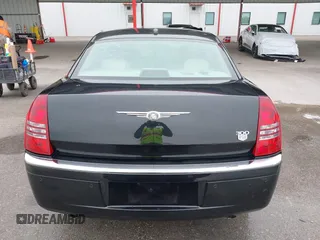 2005 Chrysler 300 with VIN 2C3AA63H45H674987, listed as a IAAI auction lot 41560730 with 101,659 mi miles. Bid and sale history available at carsss.com. Image 16.