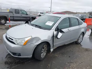 2010 Ford Focus SEL with VIN 1FAHP3HN6AW220036, listed as a IAAI auction lot 42054132 with 237,797 mi miles. Bid and sale history available at carsss.com. Image 2.