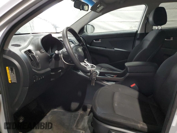 2012 Kia Sportage LX with VIN KNDPBCA22C7333385, listed as a Copart auction lot 55213455 with 160,568 mi miles and Salvage title. Bid and sale history available at DreamBid. Image 7.