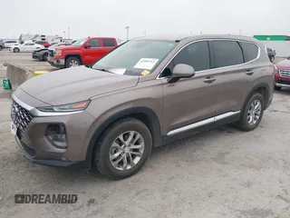 2020 Hyundai Santa Fe SEL z VIN 5NMS3CAD2LH164373, wystawiony jako IAAI lot #42099713 z przebiegiem 49 566 mil mil oraz . Historia ofert i sprzedaży dostępna na DreamBid. Obrazek 2.