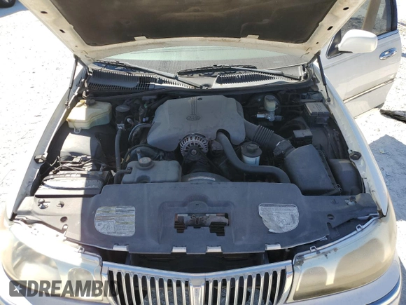 1999 Lincoln Town Car Signature z VIN 1LNHM82W4XY615634, wystawiony jako Copart lot #48886235 z przebiegiem 207 411 mil mil oraz Szkody całkowita. Historia ofert i sprzedaży dostępna na DreamBid. Obrazek 11.