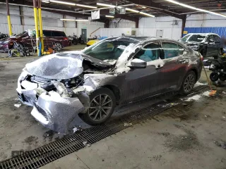 2020 Acura TLX w/Technology Pkg with VIN 19UUB1F59LA001720, listed as a Copart auction lot 45046615 with 128,218 mi miles and Salvage Title. Bid and sale history available at carsss.com. Image 1.