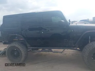 2014 Jeep Wrangler Unlimited Rubicon X with VIN 1C4HJWFG3EL274905, listed as a IAAI auction lot 41512631 with 123,961 mi miles and . Bid and sale history available at DreamBid. Image 14.