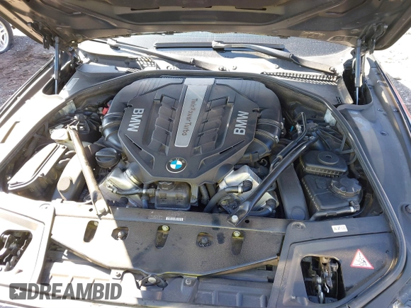 2013 BMW 5 Series 550i xDrive with VIN WBAFU9C54DDY70243, listed as a IAAI auction lot 41812862 with 85,758 mi miles and . Bid and sale history available at carsss.com. Image 10.