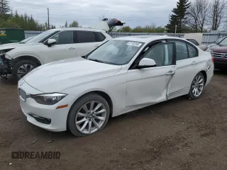 2013 BMW 3 Series 320i xDrive with VIN WBA3C3C59DF981328, listed as a Copart auction lot 57132395 with 152,458 mi miles and Salvage title. Bid and sale history available at DreamBid. Image 1.