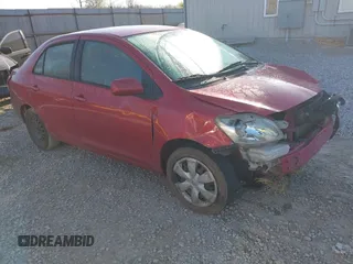 2007 Toyota Yaris with VIN JTDBT923X71065311, listed as a IAAI auction lot 42055142 with 173,949 mi miles. Bid and sale history available at carsss.com. Image 1.