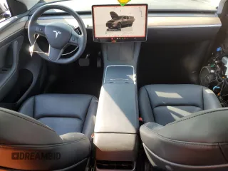 2023 Tesla Model Y Long Range with VIN 7SAYGDEE5PF834645, listed as a Copart auction lot 48596925 with 26,896 mi miles and Salvage Title. Bid and sale history available at DreamBid. Image 8.