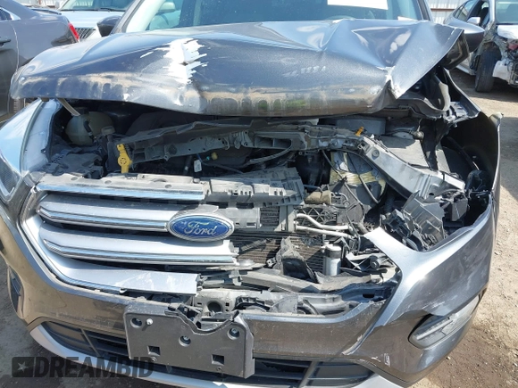 2017 Ford Escape SE z VIN 1FMCU0GD9HUD28110, wystawiony jako IAAI lot #41903505 z przebiegiem 66 808 mil mil oraz . Historia ofert i sprzedaży dostępna na DreamBid. Obrazek 6.