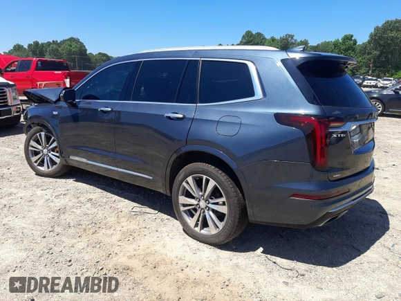 2020 Cadillac XT6 AWD Premium Luxury z VIN 1GYKPDRS3LZ112804, wystawiony jako Copart lot #56648573 z przebiegiem 80 481 mil mil oraz . Historia ofert i sprzedaży dostępna na DreamBid. Obrazek 2.