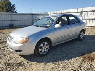 2007 Kia Spectra EX with VIN KNAFE121475450624, listed as a Copart auction lot 77712594 with 100,646 mi miles and Salvage Title. Bid and sale history available at carsss.com. Image 1.