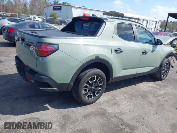 2023 Hyundai Santa Cruz SEL with VIN 5NTJC4AE3PH062553, listed as a IAAI auction lot 41712737 with 47,363 mi miles and . Bid and sale history available at DreamBid. Image 4.