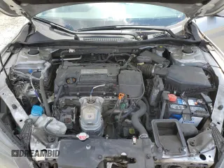 2014 Honda Accord LX z VIN 1HGCR2F34EA233303, wystawiony jako Copart lot #57420805 z przebiegiem 65 274 mil mil oraz Szkoda całkowita • Salvage title. Historia ofert i sprzedaży dostępna na DreamBid. Obrazek 11.