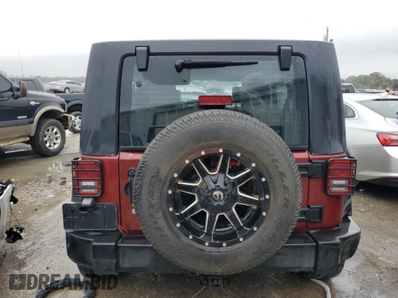2007 Jeep Wrangler Unlimited Sahara z VIN 1J4GB59157L199454, wystawiony jako Copart lot #82314724 z przebiegiem Nie podano mil oraz Czysty tytuł • Clean title. Historia ofert i sprzedaży dostępna na DreamBid. Obrazek 6.