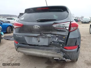 2017 Hyundai Tucson Value with VIN KM8J33A22HU358357, listed as a IAAI auction lot 41583774 with 139,338 mi miles. Bid and sale history available at carsss.com. Image 17.