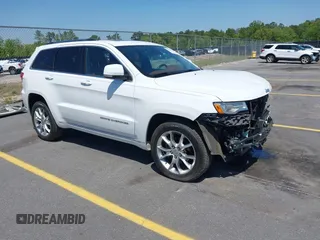 2015 Jeep Grand Cherokee Summit with VIN 1C4RJFJG1FC797711, listed as a IAAI auction lot 42026431 with 101,075 mi miles and . Bid and sale history available at DreamBid. Image 1.