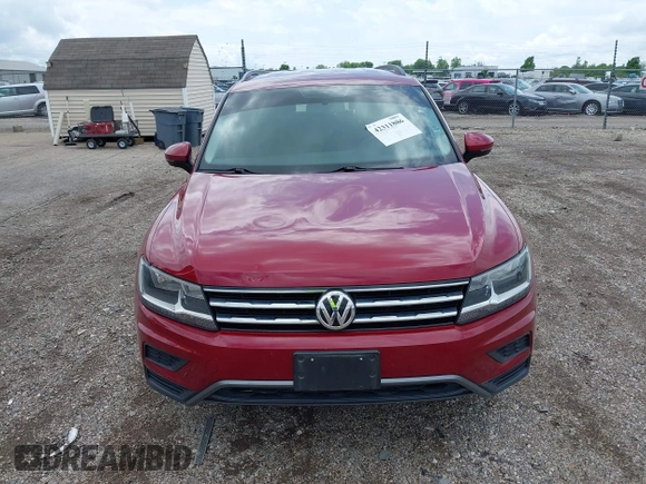 2018 Volkswagen Tiguan S with VIN 3VV1B7AX3JM045193, listed as a IAAI auction lot 42311886 with 69,049 mi miles and . Bid and sale history available at DreamBid. Image 12.