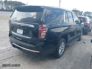 2021 Chevrolet Tahoe LT with VIN 1GNSCNKD8MR248213, listed as a IAAI auction lot 41173322 with 121,393 mi miles. Bid and sale history available at carsss.com. Image 4.