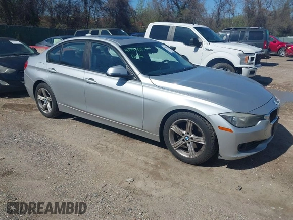 2013 BMW 3 Series 328i with VIN WBA3C1G52DNR44660, listed as a IAAI auction lot 41994277 with 165,151 mi miles and . Bid and sale history available at carsss.com. Image 1.