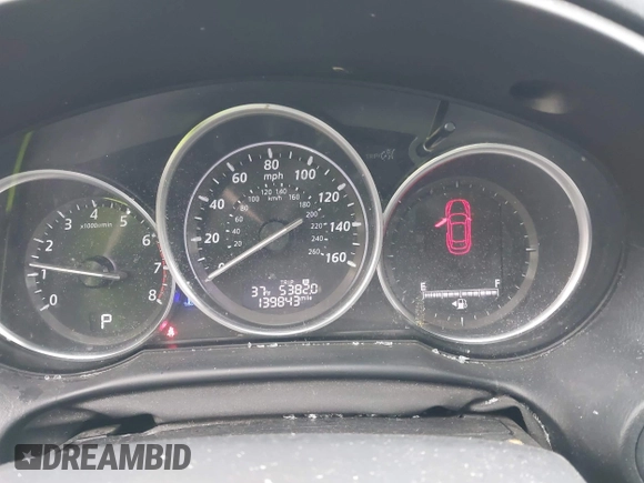 2015 Mazda CX-5 Grand Touring with VIN JM3KE4DY0F0479229, listed as a IAAI auction lot 41838381 with 139,843 mi miles. Bid and sale history available at carsss.com. Image 7.