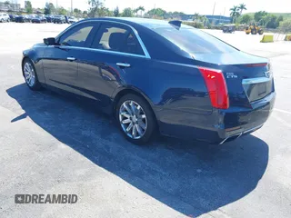 2016 Cadillac CTS RWD with VIN 1G6AP5SX8G0119984, listed as a IAAI auction lot 41679567 with 98,592 mi miles and . Bid and sale history available at DreamBid. Image 3.
