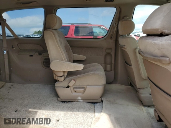 2000 Toyota Sienna LE z VIN 4T3ZF13C7YU259075, wystawiony jako Copart lot #58416105 z przebiegiem 235 788 mil mil oraz Szkoda całkowita • Salvage title. Historia ofert i sprzedaży dostępna na DreamBid. Obrazek 11.